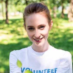 attractive-smiling-volunteer-holding-new-in-hands-2021-09-03-14-11-26-utc.jpg